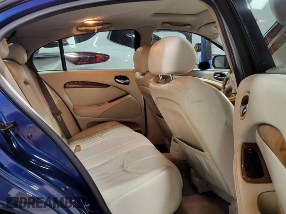 2000 Jaguar S-Type V8 z VIN SAJDA01D3YGL47987, wystawiony jako Copart lot #60103145 z przebiegiem 110 742 mil mil oraz Czysty tytuł • Clean title. Historia ofert i sprzedaży dostępna na DreamBid. Obrazek 6.