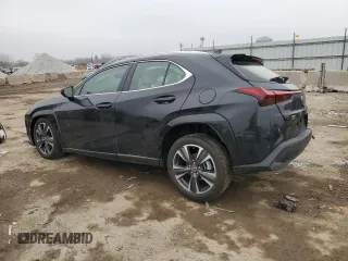 2025 Lexus UX with VIN JTHUCJDH5S2003058, listed as a Copart auction lot 43457505 with 1,239 mi miles and Salvage Title. Bid and sale history available at carsss.com. Image 2.