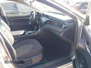 2019 Toyota Camry LE z VIN 4T1B11HK7KU756675, wystawiony jako IAAI lot #42063923 z przebiegiem 132 312 mil mil oraz . Historia ofert i sprzedaży dostępna na DreamBid. Obrazek 5.