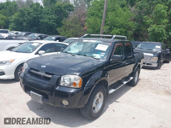 2001 Nissan Frontier SE with VIN 1N6ED27T81C305653, listed as a IAAI auction lot 42260643 with 245,547 mi miles and . Bid and sale history available at DreamBid. Image 2.
