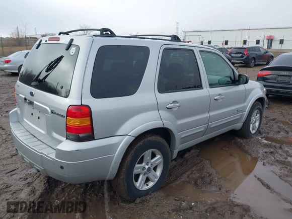2006 Ford Escape Hybrid with VIN 1FMCU96H16KB20756, listed as a IAAI auction lot 41223286 with 101,829 mi miles and . Bid and sale history available at DreamBid. Image 4.