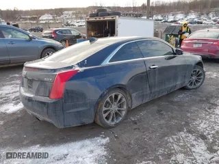2016 Cadillac ATS Coupe Luxury Collection AWD with VIN 1G6AH1RX2G0125405, listed as a IAAI auction lot 41429998 with 69,365 mi miles. Bid and sale history available at carsss.com. Image 4.