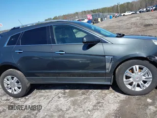 2015 Cadillac SRX Luxury Collection with VIN 3GYFNBE36FS537297, listed as a IAAI auction lot 41733421 with 147,336 mi miles. Bid and sale history available at carsss.com. Image 13.