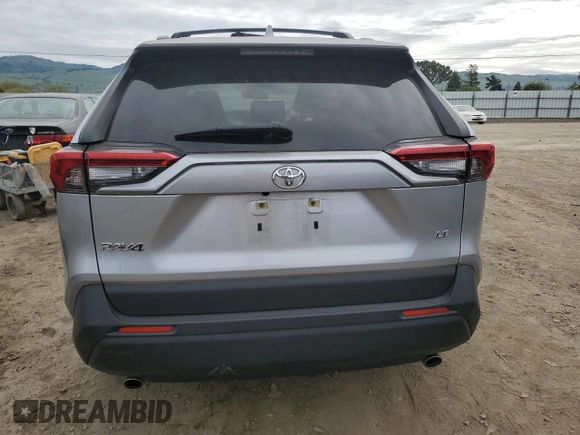 2019 Toyota RAV4 LE with VIN JTMH1RFV7KJ003899, listed as a Copart auction lot 52204315 with 27,491 mi miles and Salvage Title. Bid and sale history available at carsss.com. Image 6.