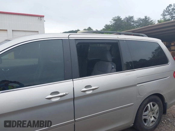 2007 Honda Odyssey EX with VIN 5FNRL384X7B036281, listed as a IAAI auction lot 42058864 with 240,791 mi miles. Bid and sale history available at carsss.com. Image 6.