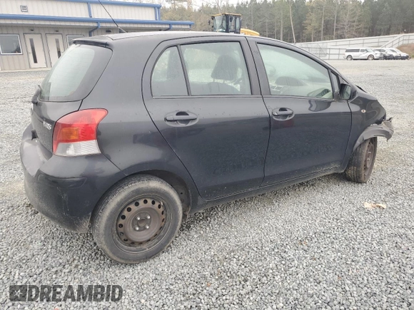 2009 Toyota Yaris with VIN JTDKT903095243922, listed as a Copart auction lot 51293545 with 196,909 mi miles and Salvage Title. Bid and sale history available at carsss.com. Image 3.