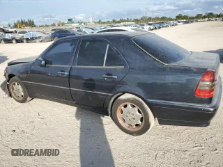 1998 Mercedes-Benz C 230/260/280/320 with VIN WDBHA23G8WA637787, listed as a Copart auction lot 88411815 with 207,843 mi miles and Salvage Title. Bid and sale history available at carsss.com. Image 2.