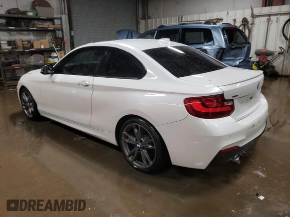 2016 BMW 2 Series M235i xDrive with VIN WBA1J9C50GV372185, listed as a Copart auction lot 88039785 with 84,187 mi miles and Salvage Title. Bid and sale history available at carsss.com. Image 2.