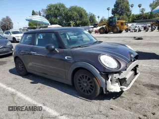 2014 MINI Hardtop with VIN WMWXM5C57ET934120, listed as a Copart auction lot 58594845 with 115,248 mi miles and Salvage title. Bid and sale history available at DreamBid. Image 4.
