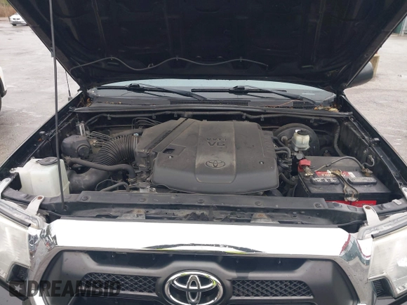 2015 Toyota Tacoma with VIN 3TMLU4ENXFM185371, listed as a IAAI auction lot 41952513 with 87,128 mi miles and . Bid and sale history available at DreamBid. Image 10.
