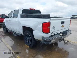 2017 Chevrolet Silverado 1500 LT with VIN 3GCPCREC6HG311064, listed as a IAAI auction lot 42026646 with 242,195 mi miles and . Bid and sale history available at DreamBid. Image 3.