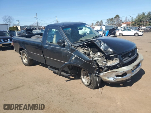1998 Ford F-150 with VIN 1FTRF18L7WNA73159, listed as a Copart auction lot 48682685 with 71,261 mi miles and Salvage title. Bid and sale history available at DreamBid. Image 4.