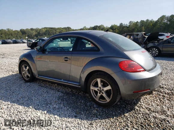 2014 Volkswagen Beetle 2.5L w/Sun with VIN 3VWJP7AT4EM612608, listed as a Copart auction lot 74679104 with 141,559 mi miles and Salvage Title. Bid and sale history available at DreamBid. Image 2.