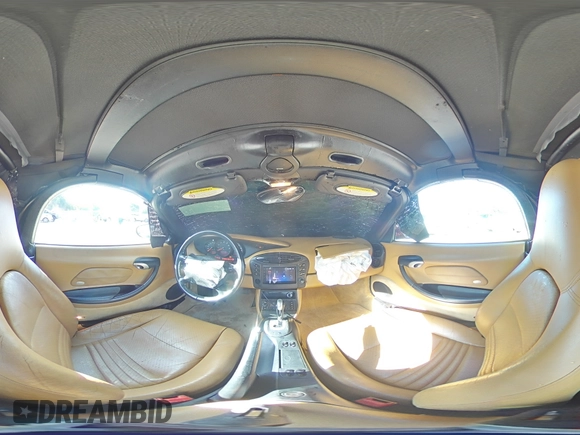 2000 Porsche Boxster z VIN WP0CA2983YU621350, wystawiony jako Copart lot #60596005 z przebiegiem 93 133 mil mil oraz Szkoda całkowita • Salvage title. Historia ofert i sprzedaży dostępna na DreamBid. Obrazek 15.