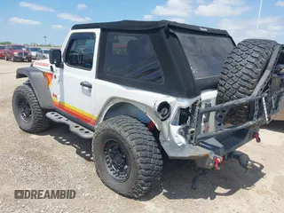 2018 Jeep Wrangler Sport with VIN 1C4GJXAN8JW302519, listed as a IAAI auction lot 42331871 with 51,639 mi miles and . Bid and sale history available at DreamBid. Image 3.