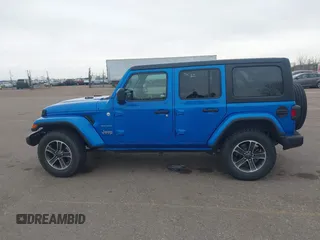 2023 Jeep Wrangler Sahara with VIN 1C4HJXEN4PW702181, listed as a IAAI auction lot 41808434 with 44,291 mi miles. Bid and sale history available at carsss.com. Image 14.