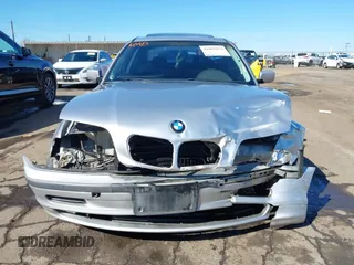 1999 BMW 3 Series 323i with VIN WBAAM3339XCD56164, listed as a IAAI auction lot 41867053 with 233,154 mi miles. Bid and sale history available at carsss.com. Image 13.