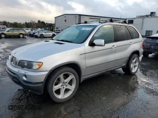 2001 BMW X5 4.4i with VIN WBAFB33581LH16948, listed as a Copart auction lot 44383785 with 143,249 mi miles and Salvage Title. Bid and sale history available at carsss.com. Image 1.