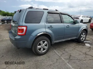 2010 Ford Escape Limited with VIN 1FMCU9EG1AKC28781, listed as a Copart auction lot 61601725 with 99,969 mi miles and Salvage title. Bid and sale history available at DreamBid. Image 3.