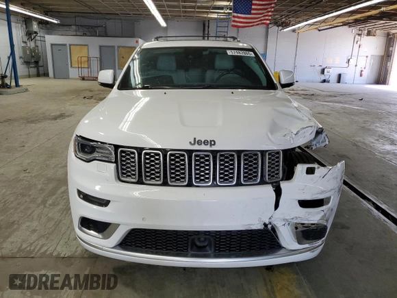 2018 Jeep Grand Cherokee Summit with VIN 1C4RJFJT5JC273869, listed as a Copart auction lot 57482865 with 70,843 mi miles and Salvage title. Bid and sale history available at DreamBid. Image 5.