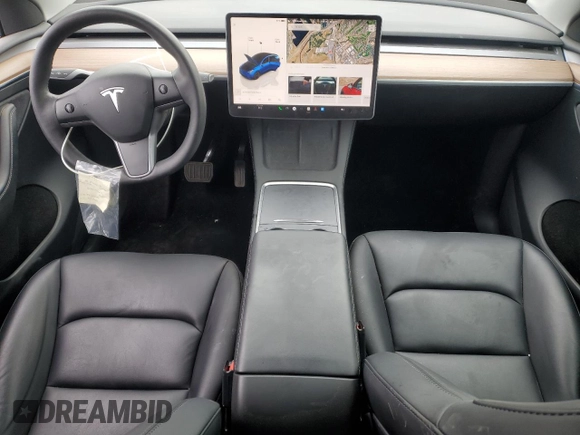 2023 Tesla Model Y Long Range with VIN 7SAYGAEE6PF689615, listed as a Copart auction lot 50999385 with 16,514 mi miles and Salvage Title. Bid and sale history available at DreamBid. Image 8.