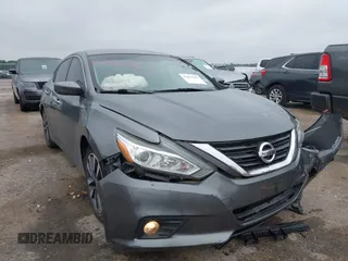 2017 Nissan Altima SV z VIN 1N4AL3AP8HC188002, wystawiony jako IAAI lot #42423163 z przebiegiem 106 617 mil mil oraz . Historia ofert i sprzedaży dostępna na DreamBid. Obrazek 1.