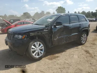 2018 Jeep Grand Cherokee Altitude z VIN 1C4RJFAG3JC284744, wystawiony jako Copart lot #61177115 z przebiegiem 140 569 mil mil oraz Szkoda całkowita • Salvage title. Historia ofert i sprzedaży dostępna na DreamBid. Obrazek 1.