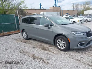 2022 Chrysler Pacifica Touring L z VIN 2C4RC1BG1NR133085, wystawiony jako IAAI lot #41981302 z przebiegiem 75 281 mil mil oraz . Historia ofert i sprzedaży dostępna na DreamBid. Obrazek 1.