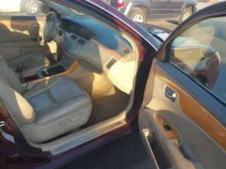 2006 Toyota Avalon XL with VIN 4T1BK36B26U077849, listed as a IAAI auction lot 41777850 with 179,719 mi miles. Bid and sale history available at carsss.com. Image 5.
