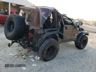 2005 Jeep Wrangler X with VIN 1J4FA39S75P308465, listed as a Copart auction lot 48693035 with Not Provided miles and Salvage Title. Bid and sale history available at DreamBid. Image 3.