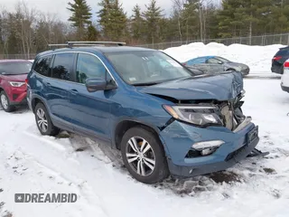 2018 Honda Pilot EX-L with VIN 5FNYF6H57JB007065, listed as a IAAI auction lot 41418432 with 123,806 mi miles. Bid and sale history available at carsss.com. Image 1.