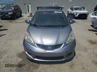 2009 Honda Fit Sport with VIN JHMGE88449S012139, listed as a Copart auction lot 60046185 with 255,292 mi miles and Clean title. Bid and sale history available at DreamBid. Image 5.