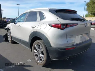 2024 Mazda CX-30 S Preferred with VIN 3MVDMBCM7RM638304, listed as a IAAI auction lot 41396590 with 15,702 mi miles and . Bid and sale history available at DreamBid. Image 3.