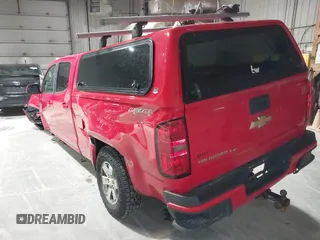 2019 Chevrolet Colorado 4WD Work Truck with VIN 1GCGTBEN8K1103282, listed as a IAAI auction lot 41987868 with 212,781 mi miles. Bid and sale history available at carsss.com. Image 3.