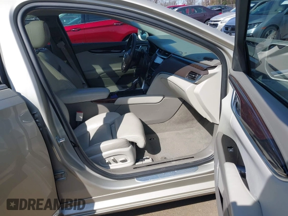 2013 Cadillac XTS Platinum z VIN 2G61U5S37D9209926, wystawiony jako IAAI lot #41754716 z przebiegiem 126 239 mil mil oraz . Historia ofert i sprzedaży dostępna na DreamBid. Obrazek 5.