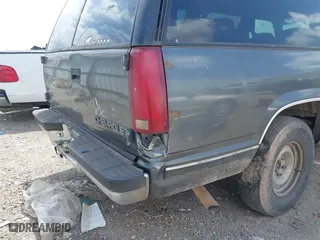 1999 Chevrolet Suburban with VIN 1GNEC16R9XJ502770, listed as a IAAI auction lot 42000467 with 245,844 mi miles. Bid and sale history available at carsss.com. Image 6.