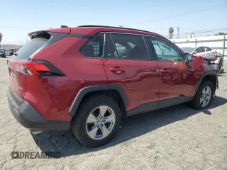 2023 Toyota RAV4 XLE with VIN 2T3W1RFV4PW267940, listed as a Copart auction lot 61827935 with 63,356 mi miles and Salvage title. Bid and sale history available at DreamBid. Image 3.