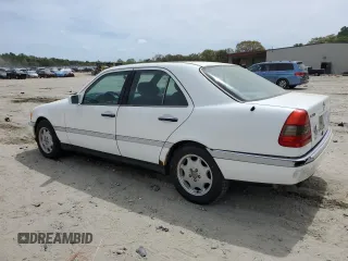 1997 Mercedes-Benz C 230/260/280/320 z VIN WDBHA28E6VA514172, wystawiony jako Copart lot #54156745 z przebiegiem 157 074 mil mil oraz Szkoda całkowita • Salvage title. Historia ofert i sprzedaży dostępna na DreamBid. Obrazek 2.