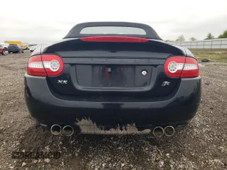 2011 Jaguar XK with VIN SAJWA4EC7BMB42394, listed as a Copart auction lot 83760564 with 67,316 mi miles and Salvage Title. Bid and sale history available at carsss.com. Image 6.