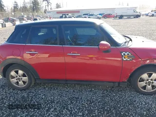 2015 MINI Hardtop 4 Door z VIN WMWXS5C59FT829635, wystawiony jako IAAI lot #42046985 z przebiegiem 171 731 mil mil oraz . Historia ofert i sprzedaży dostępna na DreamBid. Obrazek 14.