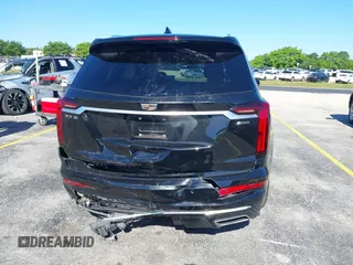 2020 Cadillac XT6 FWD Premium Luxury with VIN 1GYKPCRS7LZ211197, listed as a IAAI auction lot 42231424 with 57,351 mi miles and . Bid and sale history available at DreamBid. Image 16.