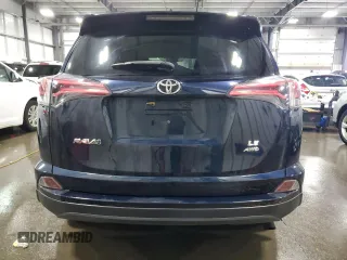 2017 Toyota RAV4 LE with VIN JTMBFREV6HJ165878, listed as a Copart auction lot 58940845 with 120,897 mi miles and Salvage title. Bid and sale history available at DreamBid. Image 6.