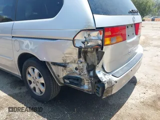 2004 Honda Odyssey EX-L with VIN 5FNRL18774B028164, listed as a IAAI auction lot 42454877 with 135,720 mi miles and . Bid and sale history available at DreamBid. Image 6.