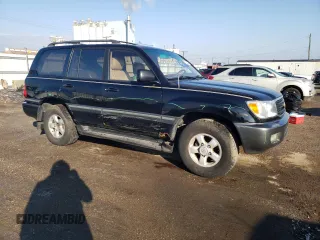 1999 Toyota Land Cruiser with VIN JT3HT05J5X0072564, listed as a Copart auction lot 77000044 with 312,428 mi miles and Salvage Title. Bid and sale history available at carsss.com. Image 4.