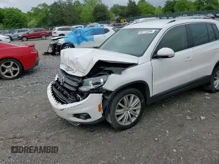 2014 Volkswagen Tiguan SE z VIN WVGAV3AX5EW551477, wystawiony jako Copart lot #55773245 z przebiegiem 153 437 mil mil oraz Czysty tytuł • Clean title. Historia ofert i sprzedaży dostępna na DreamBid. Obrazek 15.