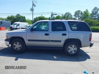2004 Chevrolet Tahoe LS z VIN 1GNEC13V04J244023, wystawiony jako IAAI lot #42135613 z przebiegiem 298 581 mil mil oraz . Historia ofert i sprzedaży dostępna na DreamBid. Obrazek 14.