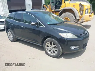 2009 Mazda CX-7 Grand Touring z VIN JM3ER29L090232929, wystawiony jako IAAI lot #42541776 z przebiegiem 169 951 mil mil oraz . Historia ofert i sprzedaży dostępna na DreamBid. Obrazek 1.