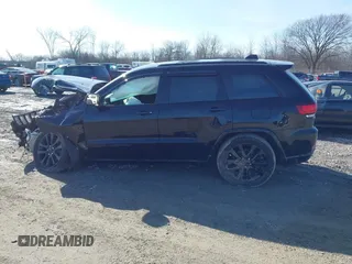 2019 Jeep Grand Cherokee Laredo E with VIN 1C4RJFAG6KC661777, listed as a IAAI auction lot 41762646 with 103,547 mi miles. Bid and sale history available at carsss.com. Image 14.