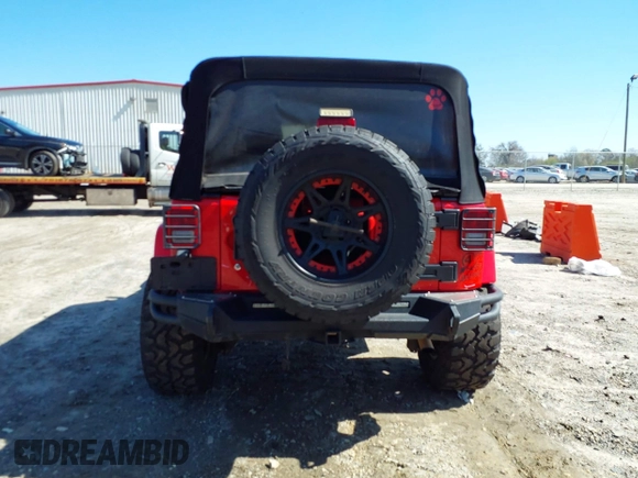 2015 Jeep Wrangler Unlimited Sahara with VIN 1C4BJWEG1FL748732, listed as a IAAI auction lot 41779308 with 109,986 mi miles. Bid and sale history available at carsss.com. Image 17.