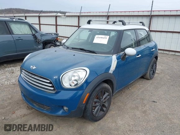 2012 MINI Countryman with VIN WMWZB3C59CWM06836, listed as a IAAI auction lot 41690459 with 172,163 mi miles and . Bid and sale history available at DreamBid. Image 2.